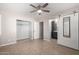 Bedroom with private bathroom access and sliding barn door at 7004 N 11Th Way, Phoenix, AZ 85020