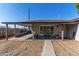 House exterior with covered patio and gravel landscaping at 7004 N 11Th Way, Phoenix, AZ 85020