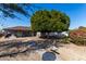 House exterior with walkway, landscaping, and gravel at 7004 N 11Th Way, Phoenix, AZ 85020