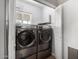 Laundry room with side by side washer and dryer at 7004 N 11Th Way, Phoenix, AZ 85020