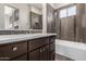 Modern bathroom featuring a vanity with drawers, a sink, and a shower-tub combo at 7456 S Brighton --, Queen Creek, AZ 85142