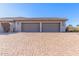 Spacious two-car garage with a wide brick driveway and well-maintained exterior at 7456 S Brighton --, Queen Creek, AZ 85142