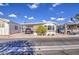 Front view of a manufactured home with a carport and landscaping at 7750 E Broadway Rd # 684, Mesa, AZ 85208