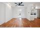 Dining area with tile flooring and open access to other rooms in the home at 8531 E Laredo Ln, Scottsdale, AZ 85250