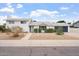 Well-maintained single-Gathering home features a clean exterior, neat landscaping, and attached garage at 8531 E Laredo Ln, Scottsdale, AZ 85250