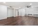 Expansive living room with built-in shelving and modern flooring at 8531 E Laredo Ln, Scottsdale, AZ 85250