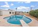 Beautiful pool with a diving board, set against a backdrop of a well-manicured backyard at 8531 E Laredo Ln, Scottsdale, AZ 85250