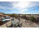 Backyard with pool and mountain views featuring an outdoor dining and seating area at 9015 E Hackamore Dr, Scottsdale, AZ 85255