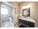 Bathroom featuring a vanity with marble countertops, a toilet and decorative accents at 9015 E Hackamore Dr, Scottsdale, AZ 85255