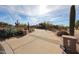 Expansive driveway leading to a beautiful home amidst lush desert landscape at 9015 E Hackamore Dr, Scottsdale, AZ 85255