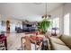 Open floor plan featuring a breakfast nook with a large fern at 9015 E Hackamore Dr, Scottsdale, AZ 85255