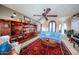 Comfortable living room showcasing built-in bookshelves, plush seating, and a decorative rug, blending style and functionality at 9015 E Hackamore Dr, Scottsdale, AZ 85255