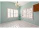 Kitchen with light-colored cabinets and a view to the outside at 9016 W Harmony Ln, Peoria, AZ 85382