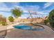 Inviting kidney shaped pool in a landscaped backyard at 9016 W Harmony Ln, Peoria, AZ 85382