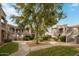 Landscaped courtyard with walking paths and trees at 9151 W Greenway Rd # 276, Peoria, AZ 85381