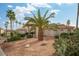 Attractive exterior view of a condo building with palm trees and landscaping at 9151 W Greenway Rd # 276, Peoria, AZ 85381