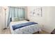 Charming bedroom with a double bed and blue bedding at 948 S Alma School Rd # 29, Mesa, AZ 85210