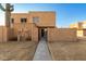 Rear exterior view showing building and walkway at 948 S Alma School Rd # 29, Mesa, AZ 85210