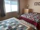 Cozy bedroom with two beds and a dresser at 9902 W Coggins Dr, Sun City, AZ 85351