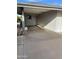 Covered carport with access to the home's entrance at 9902 W Coggins Dr, Sun City, AZ 85351