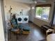 Laundry room with washer, dryer, and rocking chair at 9902 W Coggins Dr, Sun City, AZ 85351