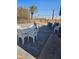 Patio area with table, chairs, and a grill at 9902 W Coggins Dr, Sun City, AZ 85351