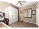 Home office with built-in white cabinets and window shutters at 11153 E New Frontier Ct, Gold Canyon, AZ 85118