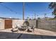 Backyard patio with seating area and string lights at 1232 E Kaler Dr, Phoenix, AZ 85020