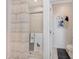 Bathroom with shower, linen towels, and neutral color palette at 12530 W Levi Dr, Avondale, AZ 85323