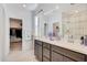Bathroom boasts double vanity, walk-in shower, and large mirror at 12530 W Levi Dr, Avondale, AZ 85323