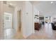 Bright entryway with tile flooring and view into living area at 12530 W Levi Dr, Avondale, AZ 85323