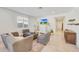 Cozy living area with modular seating, TV stand and entryway at 12530 W Levi Dr, Avondale, AZ 85323