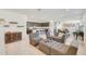 Open living space with kitchen, island, and comfortable seating at 12530 W Levi Dr, Avondale, AZ 85323