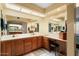 Large bathroom with double sinks and vanity at 13907 W Gable Hill Dr, Sun City West, AZ 85375