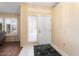 Front entry with tile flooring and a view of the living room at 13907 W Gable Hill Dr, Sun City West, AZ 85375