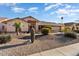 Single-story home with a two-car garage and cactus landscaping at 13907 W Gable Hill Dr, Sun City West, AZ 85375