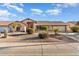Single-story home with a two-car garage and desert landscaping at 13907 W Gable Hill Dr, Sun City West, AZ 85375