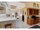 Kitchen with white cabinets, quartz countertops, and recessed lighting at 13907 W Gable Hill Dr, Sun City West, AZ 85375
