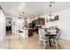 Bright and airy kitchen featuring a breakfast bar, dining area and stainless steel appliances at 14765 W Alexandria Way, Surprise, AZ 85379