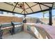 Outdoor kitchen with built-in grill and ample counter space at 14869 W Cortez St, Surprise, AZ 85379