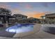 Stunning pool and spa at sunset, complete with a gazebo and patio at 14869 W Cortez St, Surprise, AZ 85379