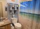 Clean bathroom with granite countertop, shower, and toilet at 14950 W Mountain View Blvd # 5112, Surprise, AZ 85374