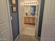 Bathroom with granite vanity, tiled floor and access to the toilet at 14950 W Mountain View Blvd # 5112, Surprise, AZ 85374
