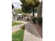 Apartment complex featuring a well maintained walkway and green spaces at 1825 W Ray Rd # 2031, Chandler, AZ 85224