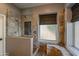 Spa-like bathroom with walk-in shower and window seat at 1890 W Wisteria Dr, Chandler, AZ 85248
