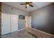 Secondary bedroom with double closets and access to hall bath at 1890 W Wisteria Dr, Chandler, AZ 85248
