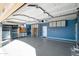 Spacious garage with built-in storage cabinets and epoxy flooring at 1890 W Wisteria Dr, Chandler, AZ 85248