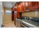 Bright laundry room with washer, dryer, and ample cabinetry at 1890 W Wisteria Dr, Chandler, AZ 85248
