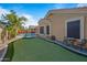 Landscaped backyard with putting green at 1890 W Wisteria Dr, Chandler, AZ 85248