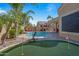 Putting green beside the pool and patio at 1890 W Wisteria Dr, Chandler, AZ 85248